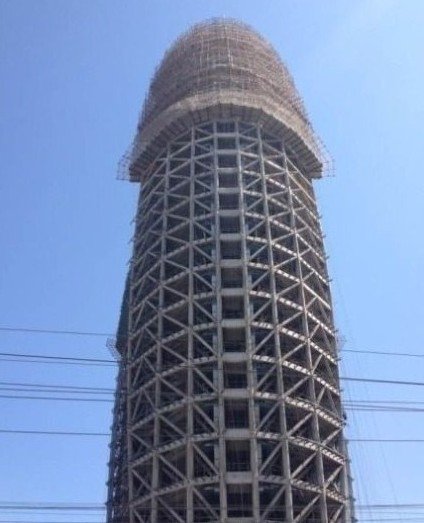 人民日报新大楼走红网络 网友称与央视大楼是绝配